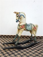 Cheval à bascule bois et plâtre peint, début XXème