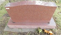 Granite headstone on base: