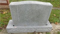 Granite headstone on base: