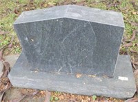 Granite headstone on base: