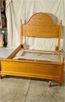Knotty Pine bed queen size.