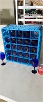 25 blue stem wine glass in plastic tray.