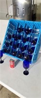 16 blue stem wine glasses.