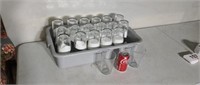 36. Ikea clear glasses in plastic bus tray.