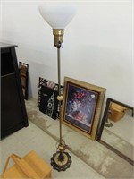 floor lamp with metal base and milk glass shade