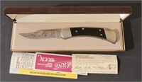Buck 110 knife 25th anniversary gold etched blade