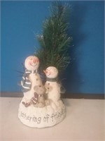 A gathering of friends snowman decoration with