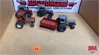 2- Die Cast 1/64 scale Tractors, 2- 1/64 scale