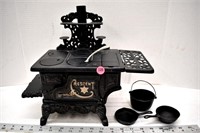 Miniature "Crescent" cast iron stove with