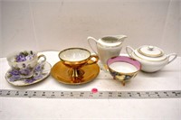 Assorted teacups w/ cream & sugar