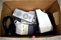 Box of assorted computer speakers