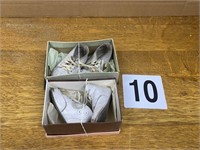 Pair of baby shoes in original boxes
