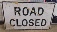 Retired Road Closed metal street sign