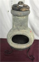Clay outdoor Chiminea on wrought iron stand