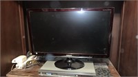 Samsung 27 inch flat screen TV with a DVD CD