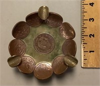 Foreign coin ashtray