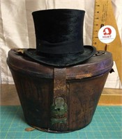 Antique top hat in leather box