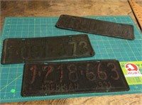 3 old license plates