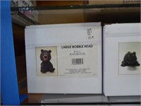 Section of giftware: bobble heads - trinket boxes