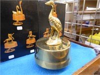 Group of assorted decor items: brass music makers