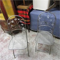 2 folding wrought iron chairs