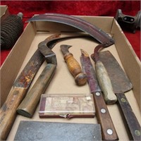 Hay knifes, butcher knives and sharpening stones