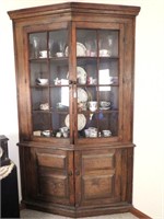 Antique Corner Cabinet with Glass Doors at the