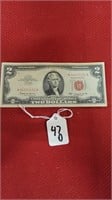 crisp 1963 red seal 2 dollar bill