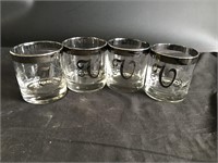 Set Of 4 Drinking Glasses Silver rimmed With V