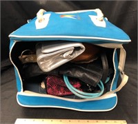 Beach bag filled with purses