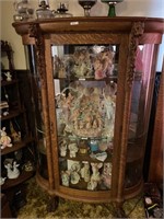 Curved vintage curio cabinet w/ornate woodwork