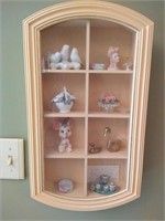 Wall cabinet with minitures