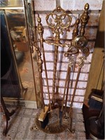 Ornate brass fireplace set