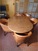 Oval pedestal dining table w/6 rolling chairs