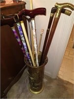 Lot of 6 canes and brass can holder