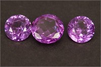 3 Purple Round Gemstones