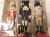 3 Nutcrackers about 9" tall with boxes