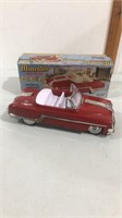 Vintage MINISTER open deluxe tin toy car, made by