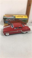 Vintage Minister deluxe tin toy car.  Comes in