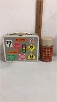 Vintage metal street sign lunchbox with thermos