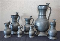 Pewter measuring cups