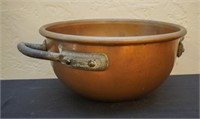 Handled copper bowl