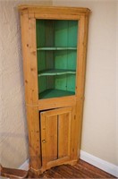 Primitive corner cabinet