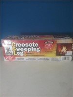 The creosote sweeping log new in box