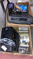 2 boxes VHS player, music CDs, cassettes