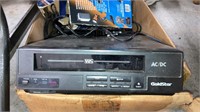 2 boxes VHS player, music CDs, cassettes