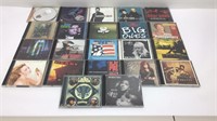 Lot of 22 music CDs. Titles are as shown.