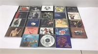 Lot of 23 music CDs. Titles are as shown.