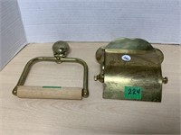 Brass toilet paper holder, shell design and a