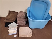 Blue bin, towels, clothes